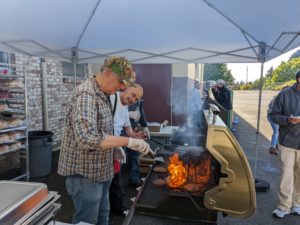 Knights of Columbus (Council 11217) cooking hamburgers & hotdogs at the 2022 BBQ